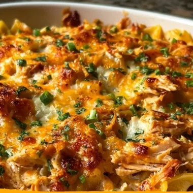 BBQ Ranch Chicken Casserole baked in a dish topped with cheese and barbecue sauce