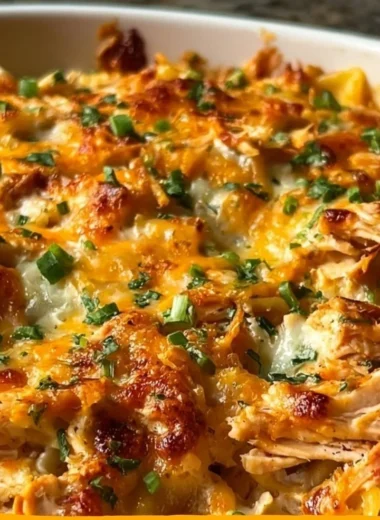 BBQ Ranch Chicken Casserole baked in a dish topped with cheese and barbecue sauce