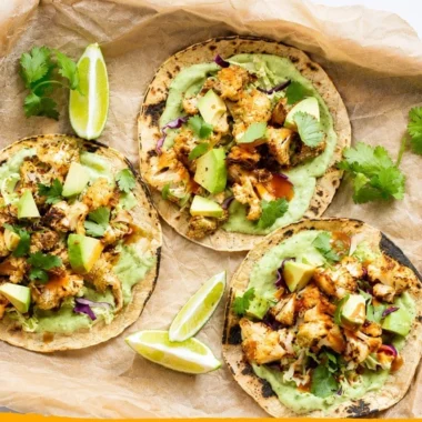 Delicious cauliflower tacos topped with creamy avocado sauce.