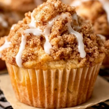 Freshly baked cozy apple crumble muffins with a crispy topping