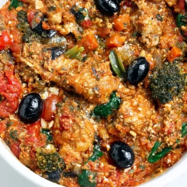 Cozy Mediterranean Chicken dish with fresh herbs and vegetables