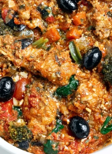 Cozy Mediterranean Chicken dish with fresh herbs and vegetables