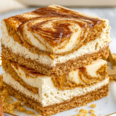 Delicious pumpkin cheesecake bars served as a cozy fall dessert