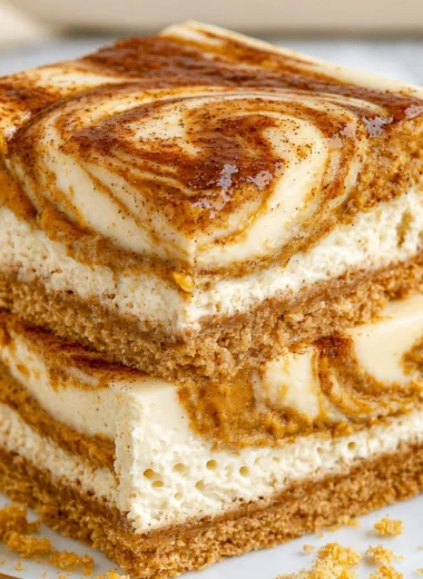 Delicious pumpkin cheesecake bars served as a cozy fall dessert