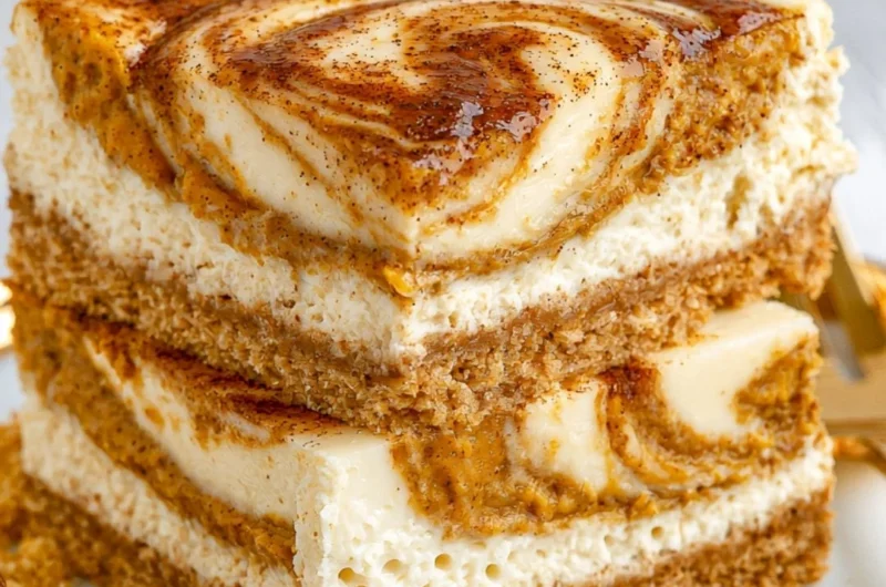Delicious pumpkin cheesecake bars served as a cozy fall dessert
