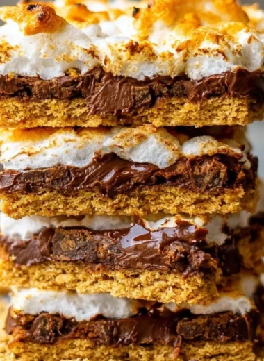Deliciously baked cozy s'more bars with chocolate and marshmallows
