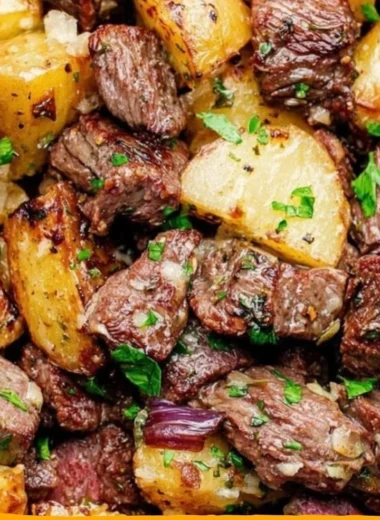 Delicious cozy steak bites served with gnocchi in a rustic setting.