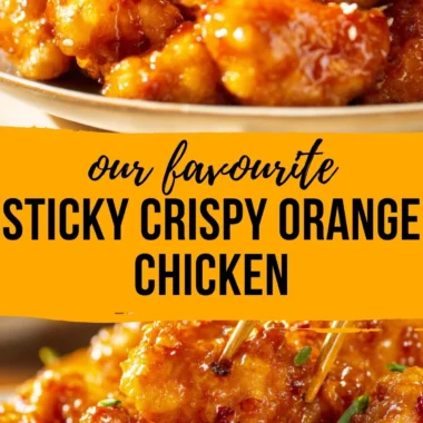 Plate of crispy orange chicken garnished with green onions and sesame seeds