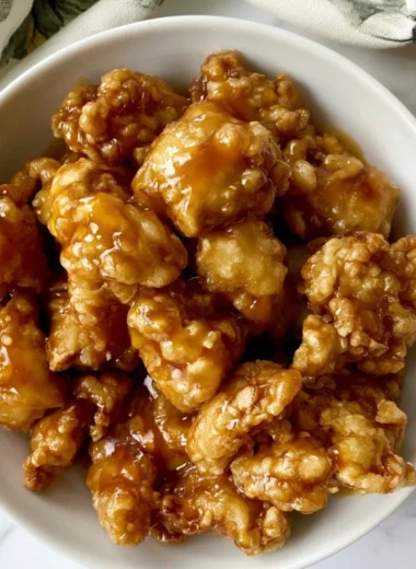 Delicious Panda Express orange chicken served with rice and vegetables