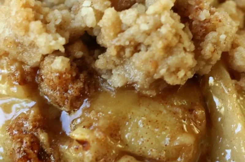 Delicious apple pear walnut crisp topped with crunchy walnuts and spices.