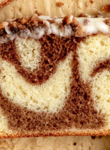 Delicious cozy cinnamon loaf cake with a warm aromatic spice topping