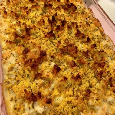Delicious easy chicken dressing casserole served in a baking dish