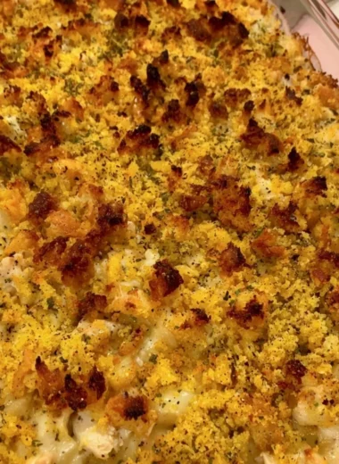 Delicious easy chicken dressing casserole served in a baking dish