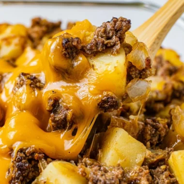 Delicious Hamburger Hash served in a bowl with colorful vegetables and ground beef.