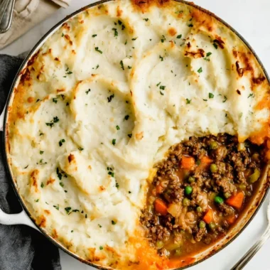 Delicious Shepherd's Pie fresh out of the oven, topped with creamy mashed potatoes.