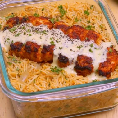 Creamy Cajun chicken and rice bowl meal prep with high protein ingredients