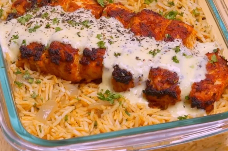 Creamy Cajun chicken and rice bowl meal prep with high protein ingredients