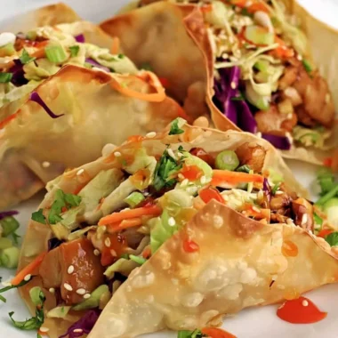 Crispy Chicken Wonton Tacos served with fresh toppings and sauces