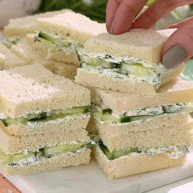 Delicious cucumber sandwiches on a plate, perfect for tea time or light snacks