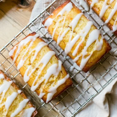 Delicious Eggnog Bread topped with a sweet sugar rum glaze, a festive holiday treat.