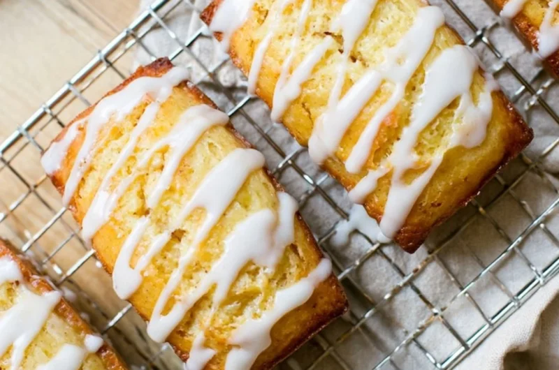 Delicious Eggnog Bread topped with a sweet sugar rum glaze, a festive holiday treat.