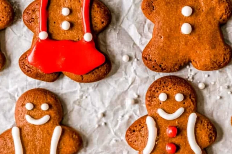 Soft and chewy gingerbread man cookies freshly baked and decorated